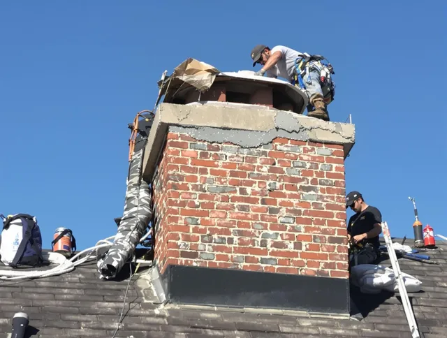 Westminster Chimney Sweep installing a custom chimney crown in Westminster, CA